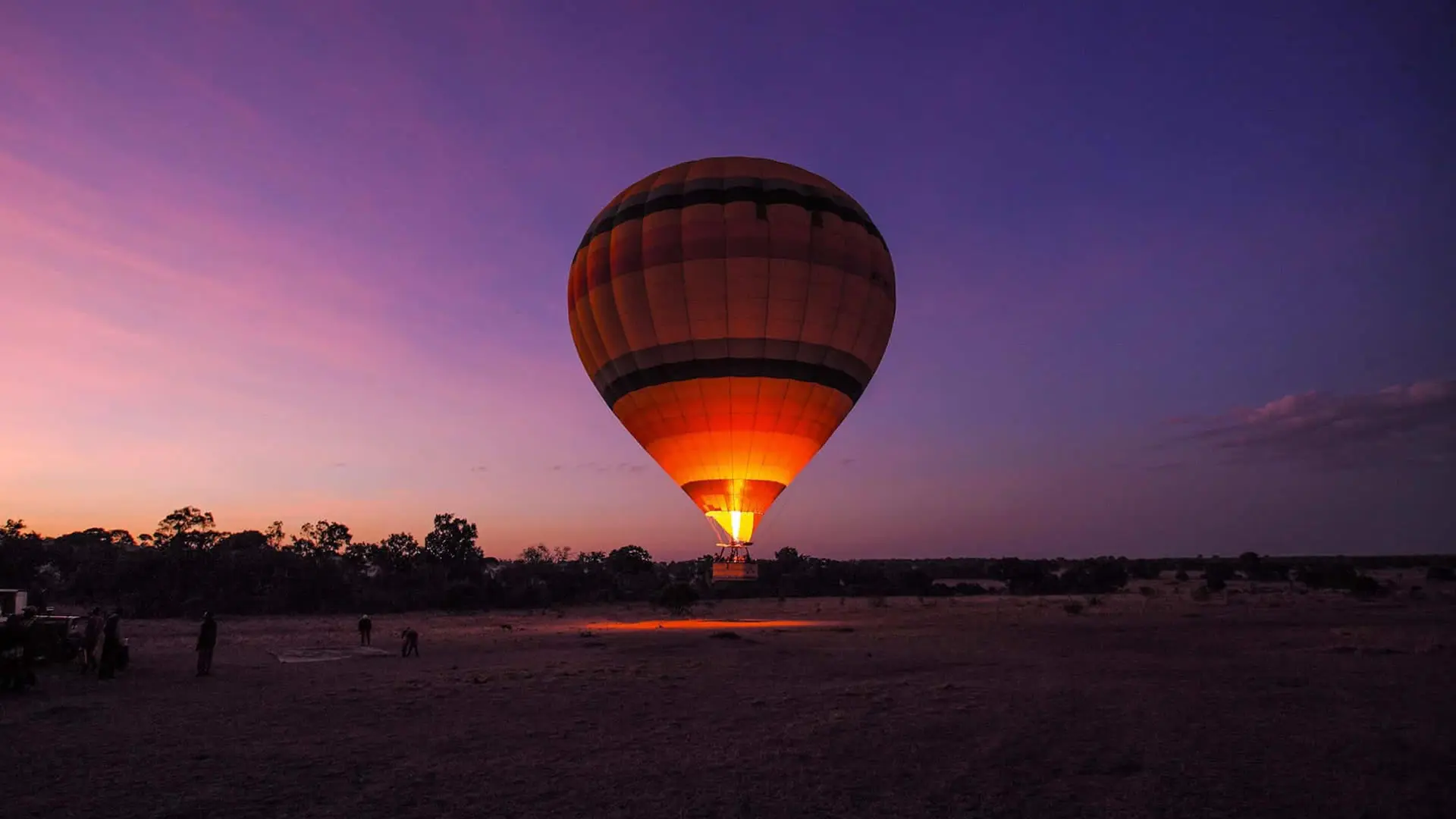 A hot air balloon over the Maasai Mara at sunrise